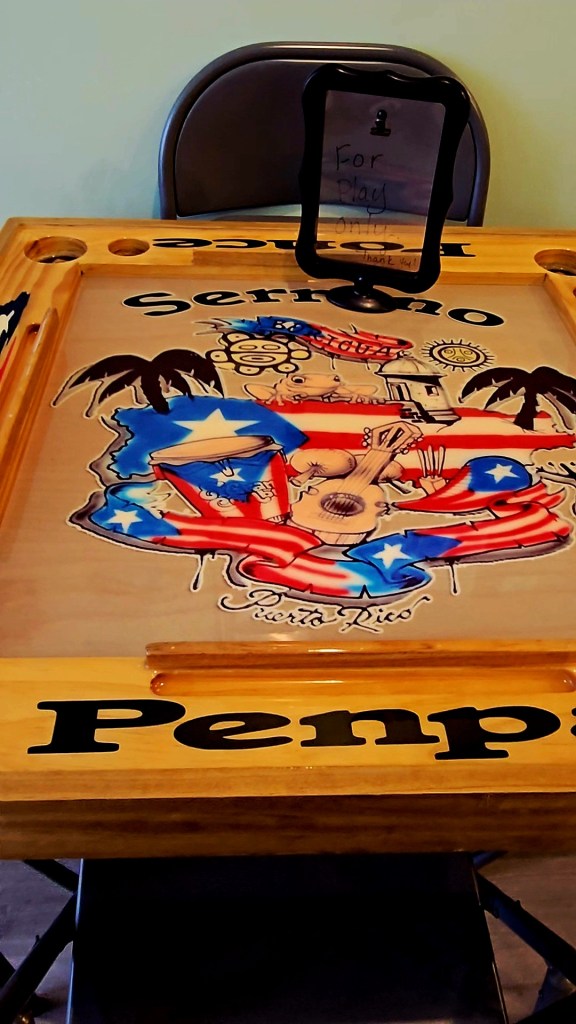 On a snowy January day, I stopped by Café con Amor Jíbaro in downtown Middletown, NY, and instantly felt the warmth of Boricua hospitality. From Kimberly and her sister pressing sandwiches behind the counter to Mama Maria greeting you like family, this café is all corazón. Inspired by Abuelo—whose face proudly represents the shop—Café con Amor Jíbaro serves rich coffee, Pan Sobao sandwiches, and Puerto Rican pride in every corner.